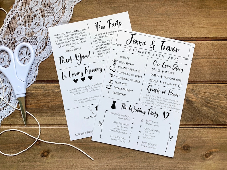 May include: Two printed wedding programs with black text on white paper, featuring the names "Jenna & Trevor" and wedding details. A pair of scissors and lace trim are visible on a wooden surface.