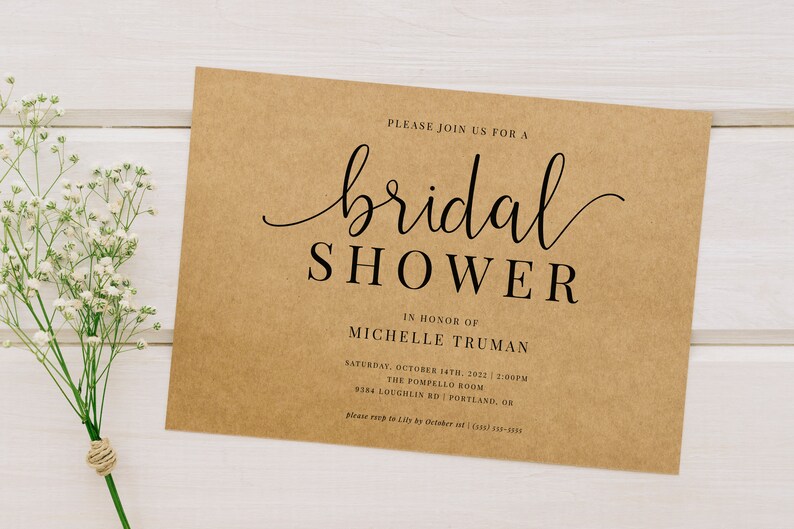 May include: A brown paper bridal shower invitation with the text "PLEASE JOIN US FOR A bridal SHOWER IN HONOR OF MICHELLE TRUMAN SATURDAY, OCTOBER 14TH, 2022 | 2:00PM THE POMPELLO ROOM 9384 LOUGHLIN RD | PORTLAND, OR please RSVP to Lily by October 1st | (503) 555-5555"