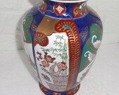 Listing 93 is the Colorful detailed hand painted Gold Imari Vase