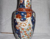 Old Imari style porcelain vase with authentication on bottom