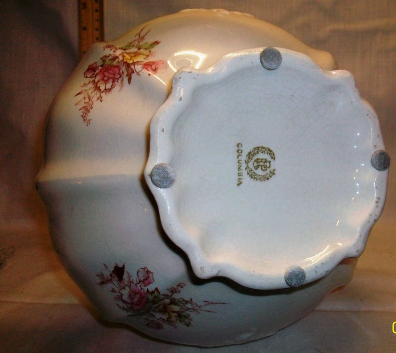 Listing 233 is the Revere Pottery White Floral Pitcher And Basin