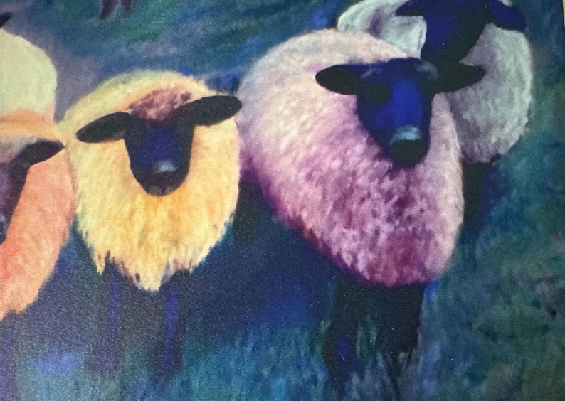 May include: A colorful painting of several sheep with fluffy wool. The sheep have black faces and ears, and their wool is various shades of yellow, pink, and white. The background is a blend of blue and green.