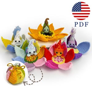 May include: A collection of colorful, crocheted flower dolls with smiling faces and whimsical hats. Each doll is nestled within a vibrant flower, showcasing a variety of colors. A small, crocheted drawstring bag is also included. The image includes the text "PDF".