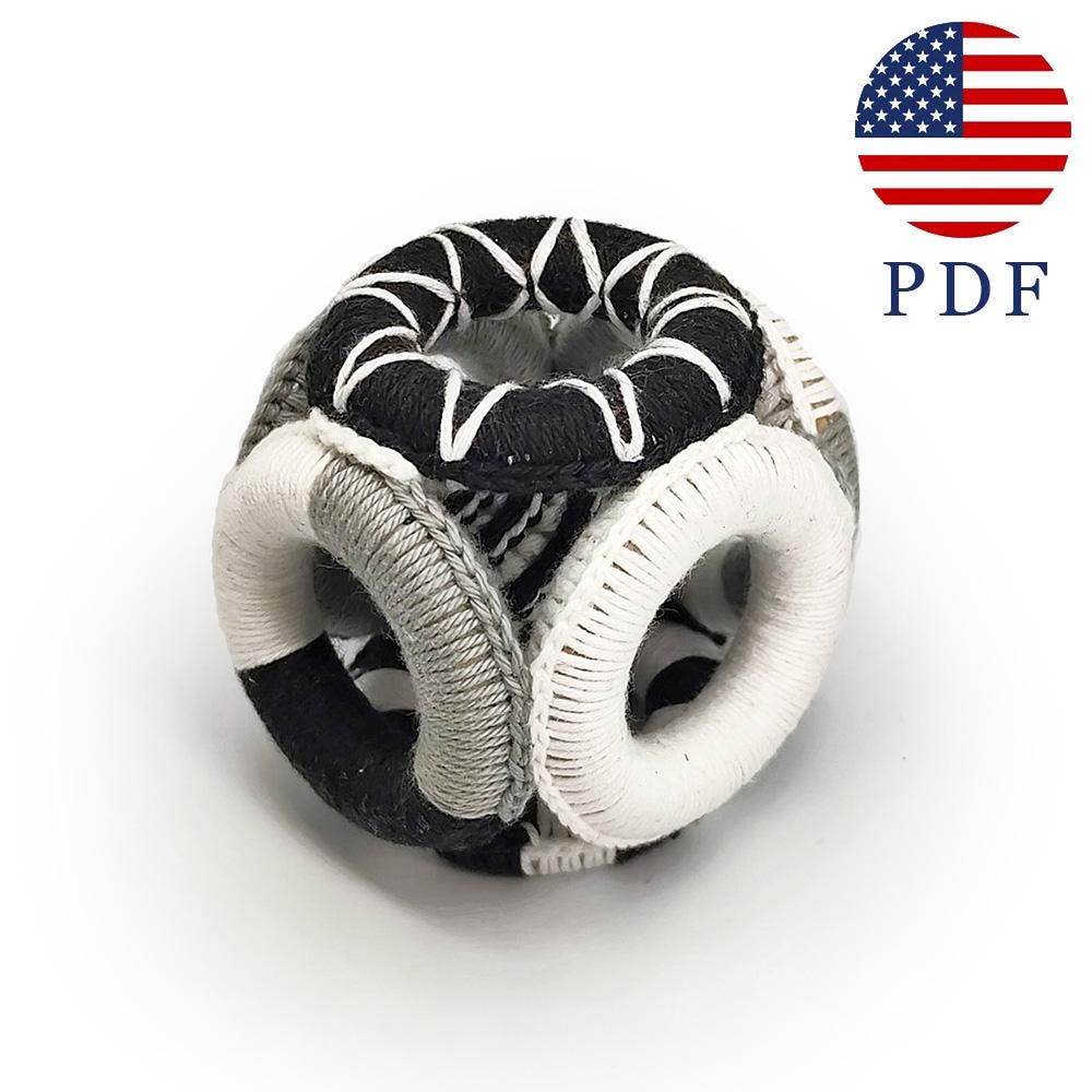 30 Beautiful and Stylish Monochrome Crochet Patterns 18 Monochrome Baby Rattle Cube Pattern