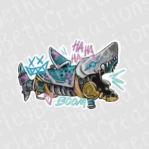 May include: A sticker featuring a stylized shark-shaped weapon with a gray head, teal and purple accents, and the text "HA HA HA" and "BOOM". The design includes a crown and heart.