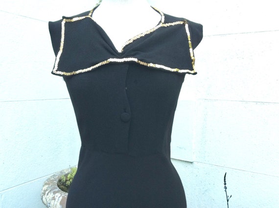 70s does 30s black vintage crepe dress with huge b