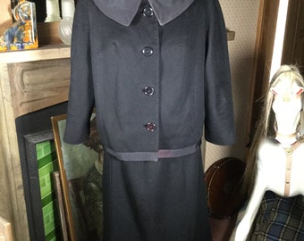 60s black suit; skirt and jacket set in soft wool.