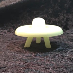 Glow in the dark UFO blue and green