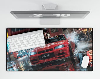 May include: A red and black car with a white license plate that reads "15-44" is driving on a wet road. The car is surrounded by water and there is a keyboard in the foreground.