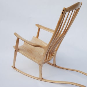Comfortable rocking chair made of solid maple wood