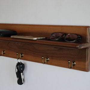 Entryway organizer. clothes hanger, keys, wallet, phone