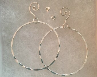 Large silver hoops on posts