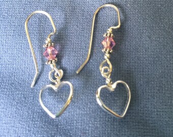 Silver hearts with pink crystal