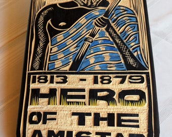 Hand carved plaques commemorating, African history.