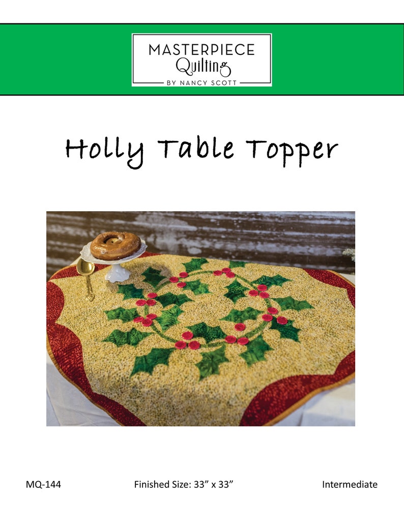May include: A quilted table topper with a holly wreath design. The topper is 33 inches by 33 inches and features a red and green color scheme. The text "Holly Table Topper" is written in black at the top of the image. The text "MQ-144" is written in black at the bottom left of the image. The text "Finished Size: 33" x 33" is written in black at the bottom center of the image. The text "Intermediate" is written in black at the bottom right of the image.