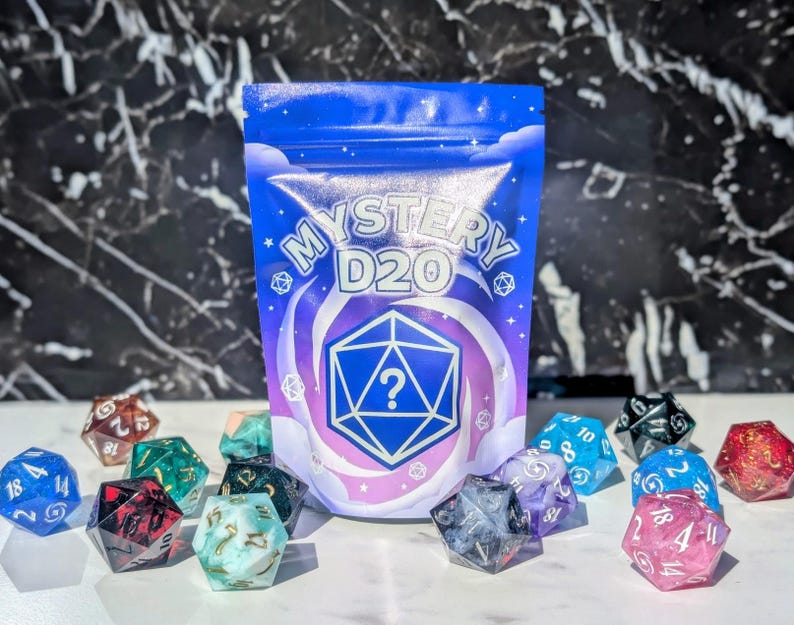 May include: A blue pouch with the text "MYSTERY D20" and a question mark inside a geometric shape. Assorted colorful polyhedral dice are scattered around the pouch, including blue, red, green, and purple dice.