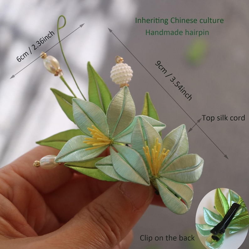 May include: A handmade green and yellow flower hair pin with a silk cord and a clip on the back. The hair pin is 3.54 inches tall and 2.36 inches wide. Inheriting Chinese culture.