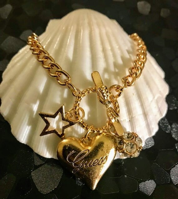 Guess charm bracelet on sale gold