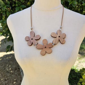 Tasmanian Timber triple flower necklace. Blackwood. Myrtle. Huon pine. Flower necklace. wooden flowers. Wooden necklace. retro style