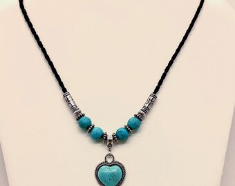 Necklace, black leather, pearls, and turquoise heart pendant,