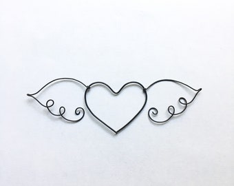 Heart with wings Flying heart Flying kiss Symbol of love
