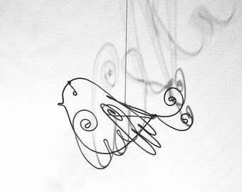 Small decorative bird to hang