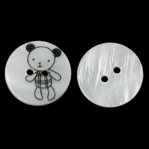 batch of 10 &quot;ousron&quot; buttons in natural shell, 20 mm in diameter