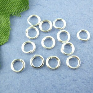 batch of 10 grams of open silver metal rings 5 mm in diameter