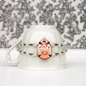 bracelet goutte en céramique récyclée fleurie image 1
