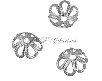 May include: Three silver metal bead caps with a flower-shaped design. The caps have a small hole in the center for threading beads.