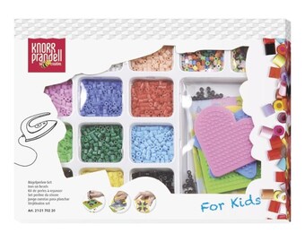May include: A colorful box of beads for kids to create designs. The box includes a variety of colors, shapes, and sizes of beads, as well as a small iron for melting the beads together. The box also includes a variety of templates for creating different designs. The box is labeled "For Kids" and has the brand name "Knorr Prandell" on it.