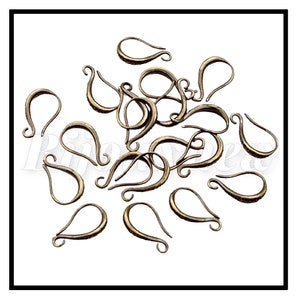 Lots supports crochets boucles doreilles. Bronze