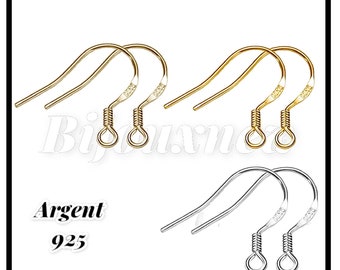 May include: A set of six earring hooks in three different finishes: gold, silver, and rhodium. The hooks are made of 925 sterling silver and are perfect for making earrings.