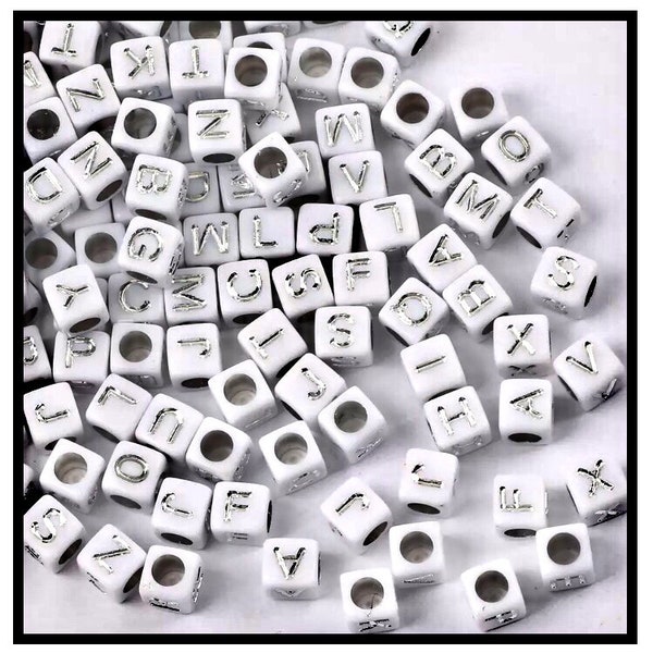 X10pcs cube beads white and silver alphabet letters.