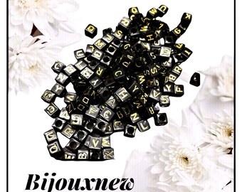 X10pcs perles cubes lettres alphabet.