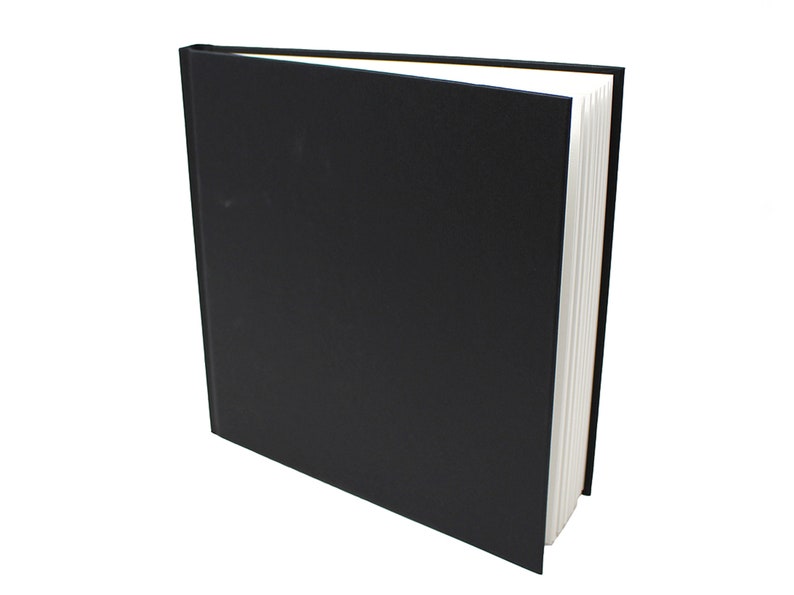 May include: A black hardcover book with a white spine. The book is closed and standing upright on a white background.