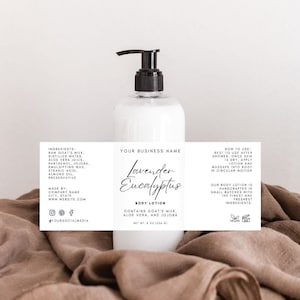 May include: A white bottle of Lavender Eucalyptus body lotion with a black pump top. The label is white with black text and includes the ingredients: Raw Goat's Milk, Distilled Water, Aloe Vera Juice, Panthenol, Jojoba, Emulsifying Wax, Stearic Acid, Almond Oil, Preservative. The label also includes the text "Your Business Name", "Lavender Eucalyptus", "Body Lotion", "Contains Goat's Milk, Aloe Vera, and Jojoba", "Net Wt. 8 oz (224 g)", "How to Use: Best to use after shower. Once skin is dry, apply lotion and massage into body in circular motion", "Our body lotion is handcrafted in small batches with the finest and freshest ingredients.", "Vegan", and "AM".