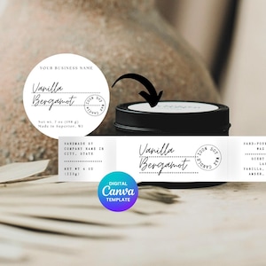 Puede incluir: Una lata de vela negra con una etiqueta blanca que dice "Vanilla Bergamot". La etiqueta también incluye el texto "Vela de cera de soja vertida a mano" y notas de fragancia. La vela pesa 198 g.