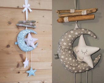 Hanging moon stars in driftwood and fabric decoration baby child's room
