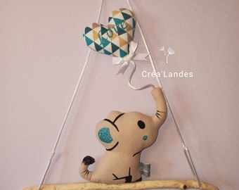 Wall decoration baby elephant and his driftwood and fabric balloon