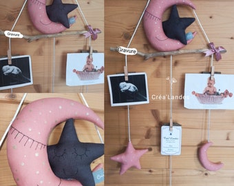 Old pink and stormy gray tone photo holder driftwood and fabric wall decoration for baby room