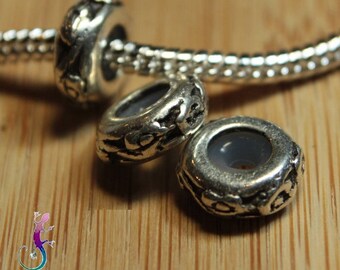 Lot de 2 perles stoppeuses en métal argenté décor fleur pour bracelet ou collier européen