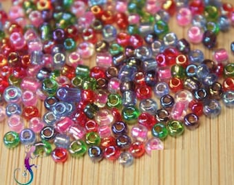 Set of 20g of rock beads in iridescent multicolored glass 2mm