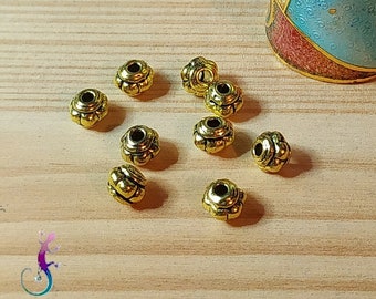 Lot de 30 perles intercalaires "motif ethnique" en métal doré antique