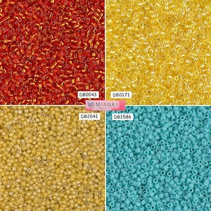 May include: Four different colours of seed beads, red, yellow, light yellow, and turquoise. The beads are arranged in a grid pattern. The beads are all the same size and shape. The beads are made of glass and have a shiny finish. The beads are labelled with the brand name "MIYUKI" and the product code.