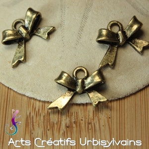 Lot of 4 bow charms in bronze metal 17x15mm