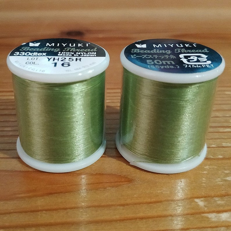 A spool of Miyuki nylon thread Vert