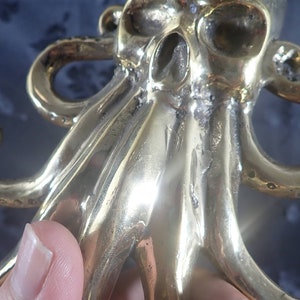 Back texture brass octopus hook handmade metal kraken wall decor craftsmanship detail
