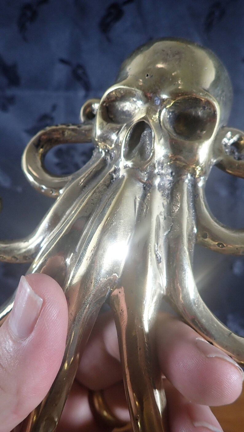 Back texture brass octopus hook handmade metal kraken wall decor craftsmanship detail