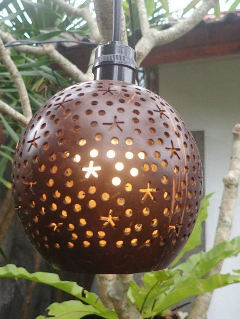 Outdoor coconut lamp hanging in tree, tropical coconut shell patio lighting handmade